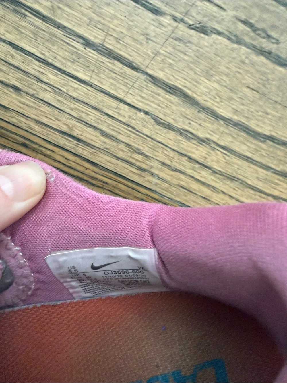 Nike Pink Low-Top Basketball Sneakers with White Swoosh